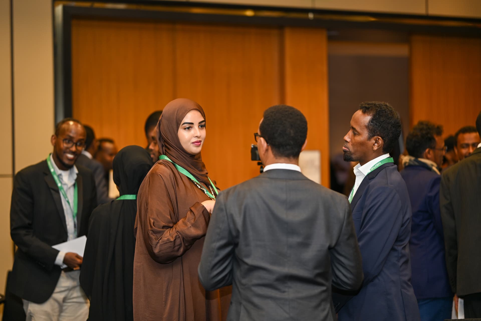 Attendees networking at a SNABPI conference